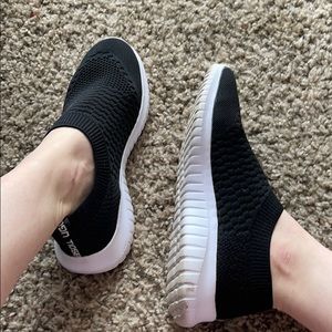 Black pull-on sneakers